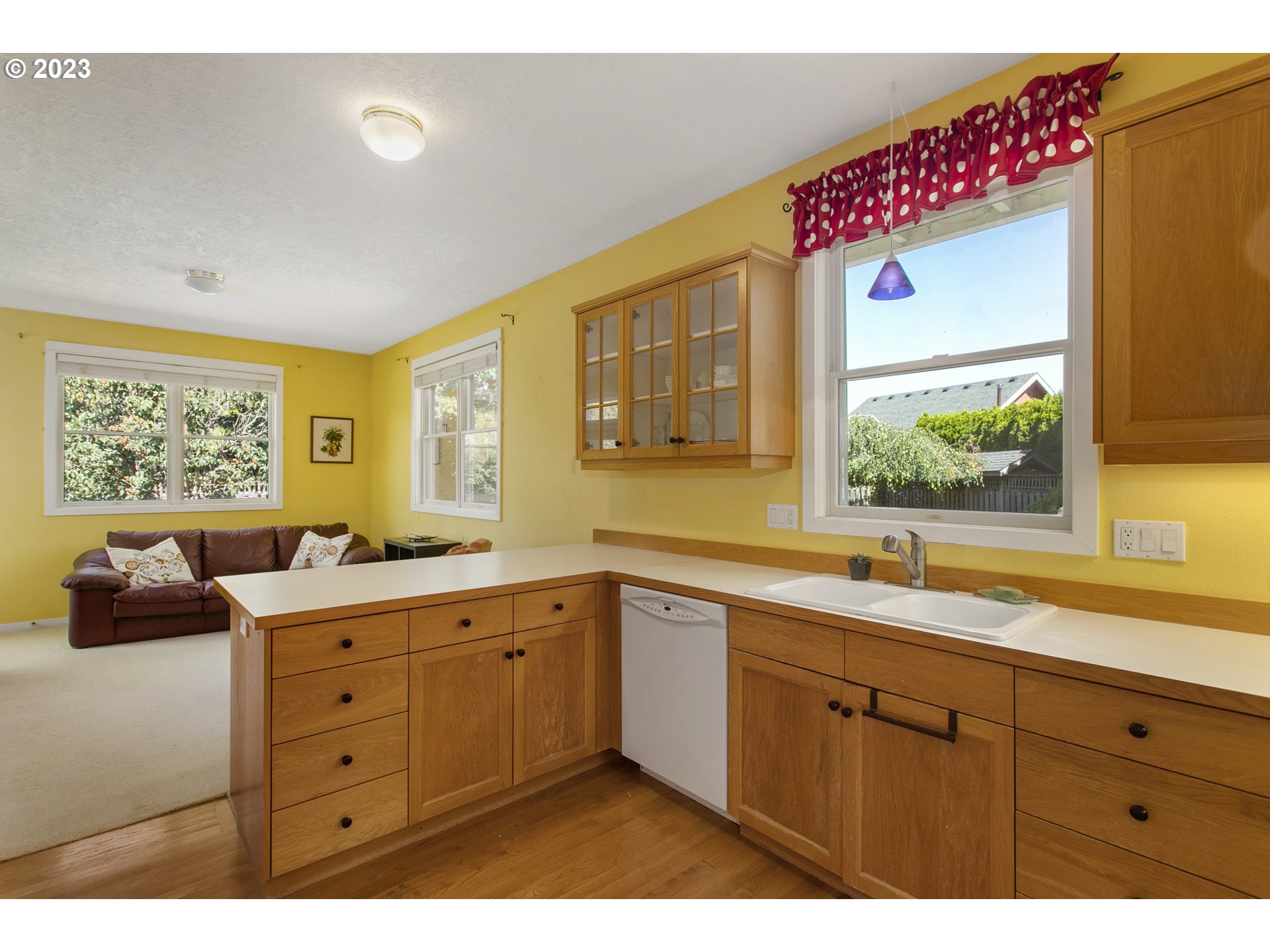 2371 Miller Farm Road Woodburn, OR 97071 - Photo 19 of 33 a kitchen with a sink window and cabinets
