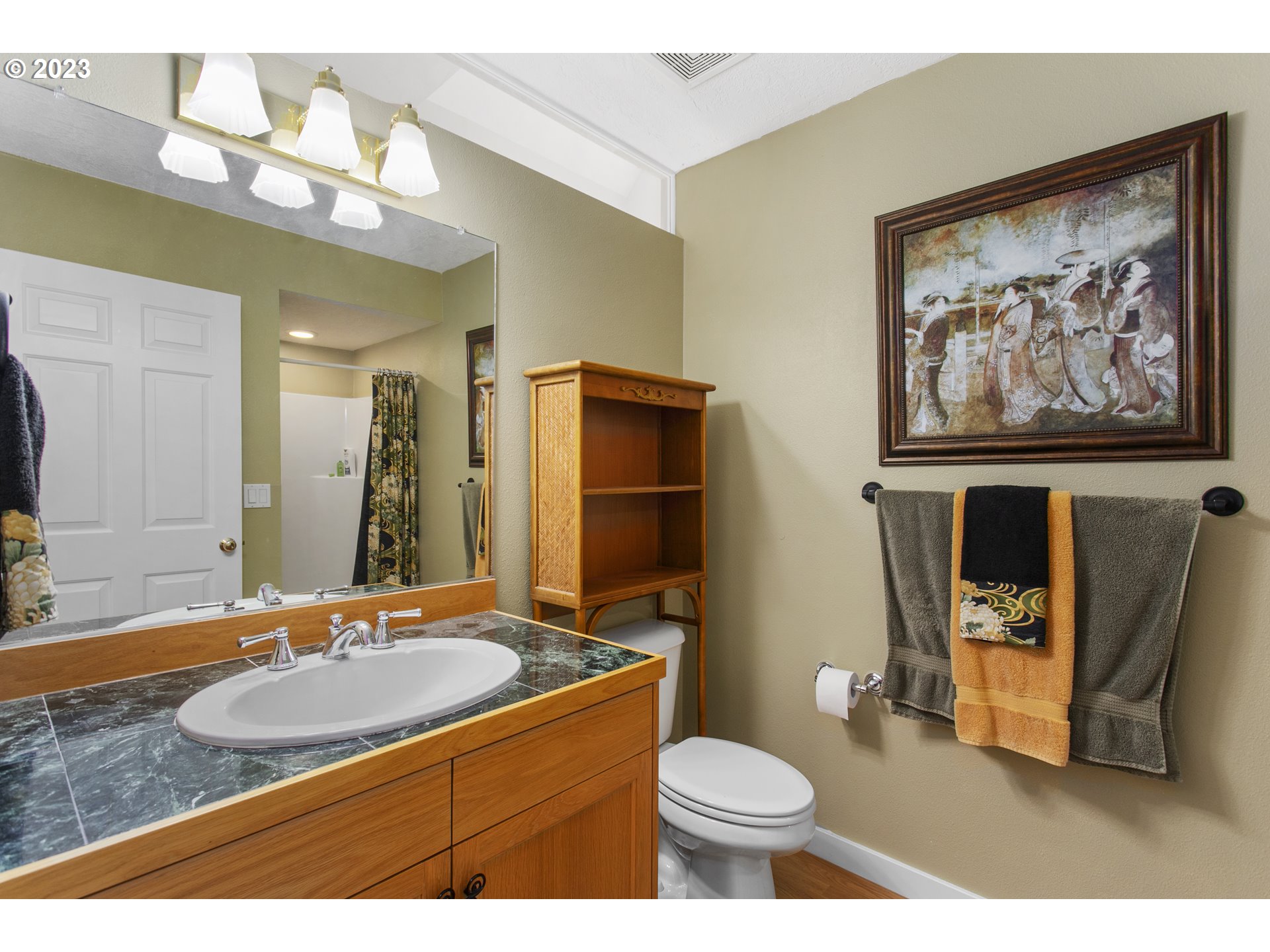 2371 Miller Farm Road Woodburn, OR 97071 - Photo 23 of 33 a bathroom with a sink and a mirror