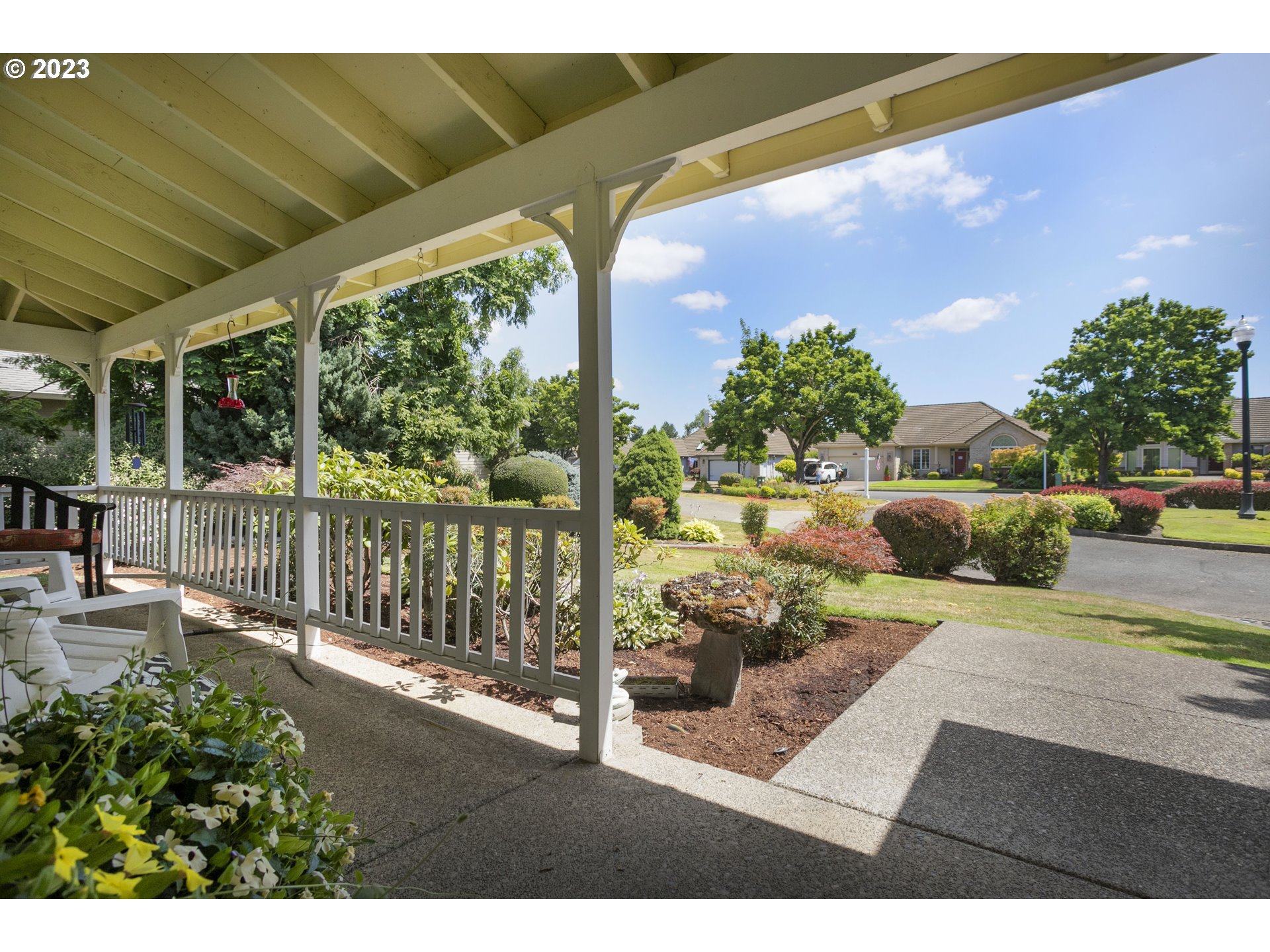 2371 Miller Farm Road Woodburn, OR 97071 - Photo 5 of 33 a view of a porch with furniture and a yard