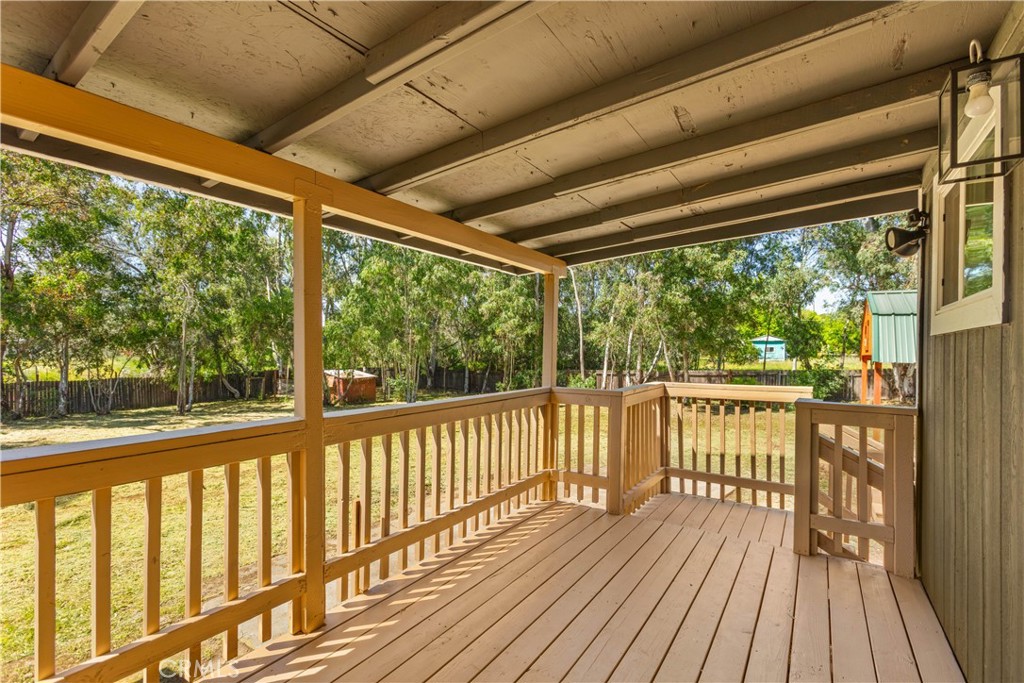 4936 Lower Wyandotte Road Oroville, CA 95966 - Photo 21 of 41 a view of a balcony with wooden floor