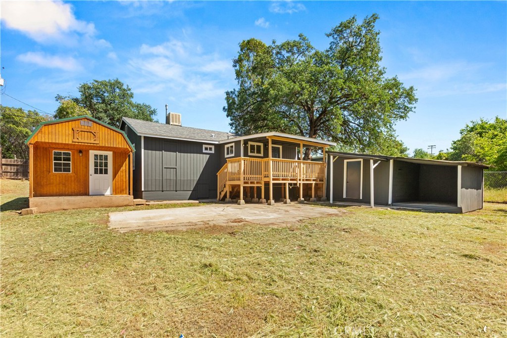 4936 Lower Wyandotte Road Oroville, CA 95966 - Photo 24 of 41 a front view of a house with a yard