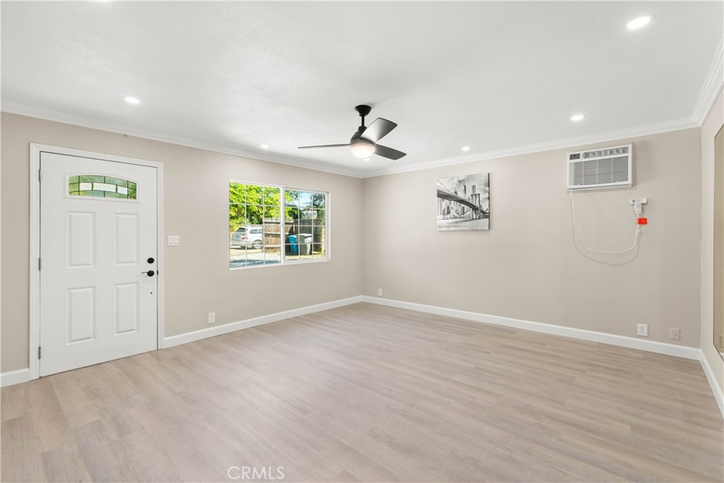 4936 Lower Wyandotte Road Oroville, CA 95966 - Photo 5 of 41 an empty room with windows and ceiling fan