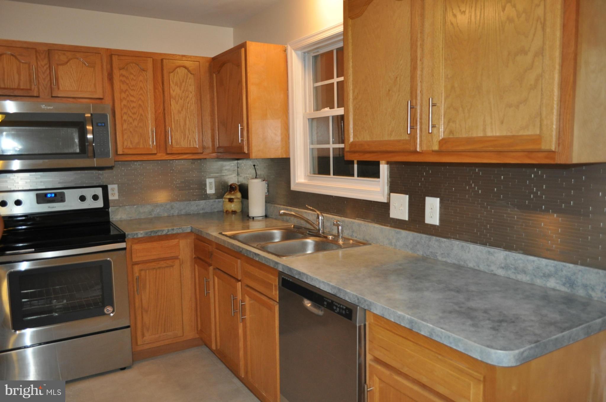 484 Thumper Drive Ranson, WV 25438 - Photo 4 of 30 Beautiful kitchen with stainless steel applicances