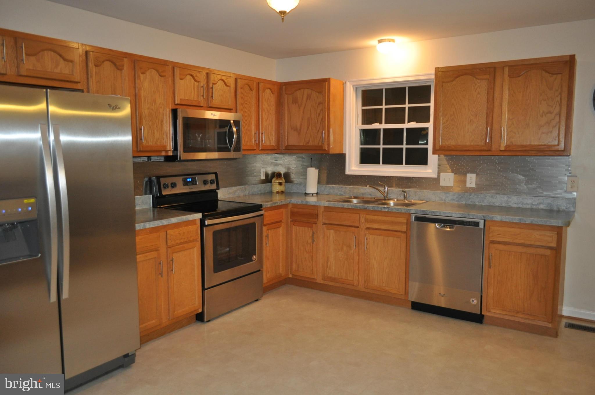 484 Thumper Drive Ranson, WV 25438 - Photo 7 of 30 Kitchen has plenty of space for a future island