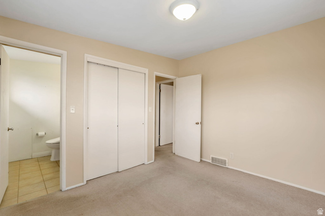 447 550 South Bountiful, UT 84010 - Photo 8 of 25 Carpeted room with neutral wall tones and a ceiling-mounted light fixture