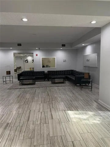 a view of a building with a tree