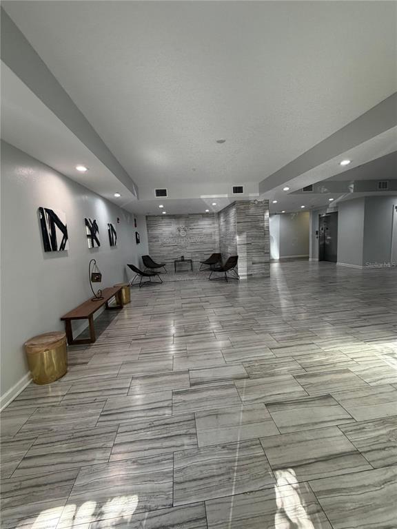 2121 McCoy Road, Unit 337 Orlando, FL 32809 - Photo 18 of 22 a view of a room with wooden floor