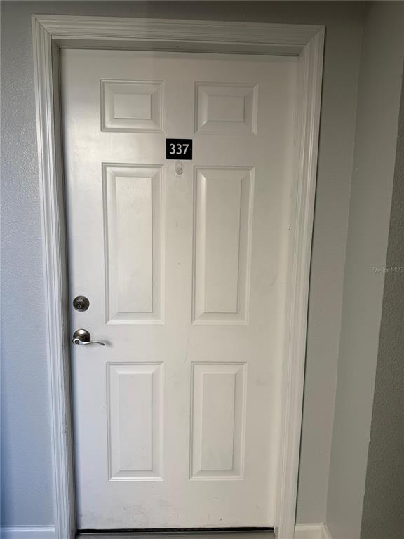 2121 McCoy Road, Unit 337 Orlando, FL 32809 - Photo 2 of 22 a view of cupboard