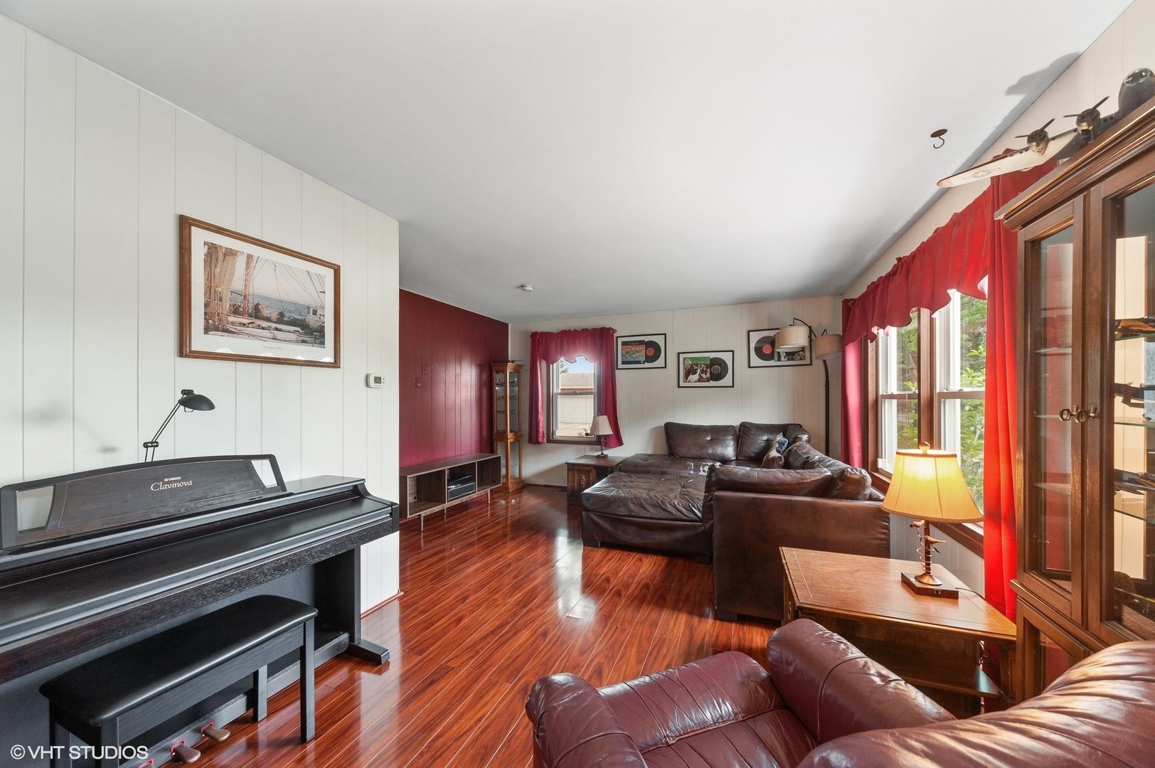 205 Wheeling Avenue Wheeling, IL 60090 - Photo 2 of 25 a living room with furniture and a window