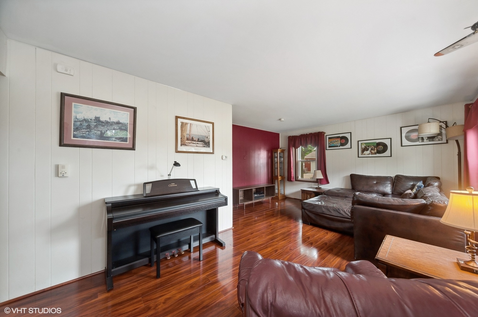205 Wheeling Avenue Wheeling, IL 60090 - Photo 3 of 25 a living room with furniture and a piano