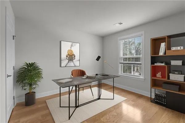 a workspace with furniture and window