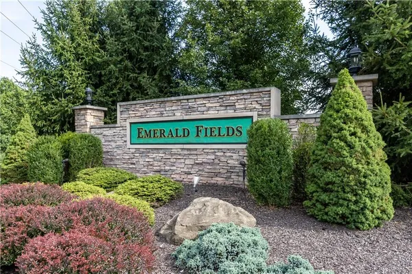 a sign on the side of a road