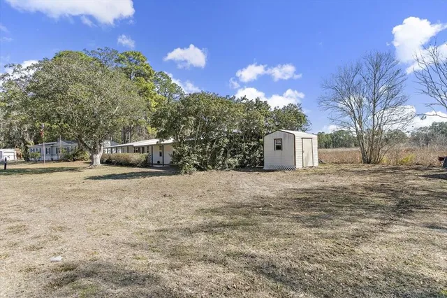 a house with trees in front of it