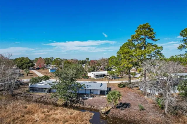 a view of a street with a building in the background