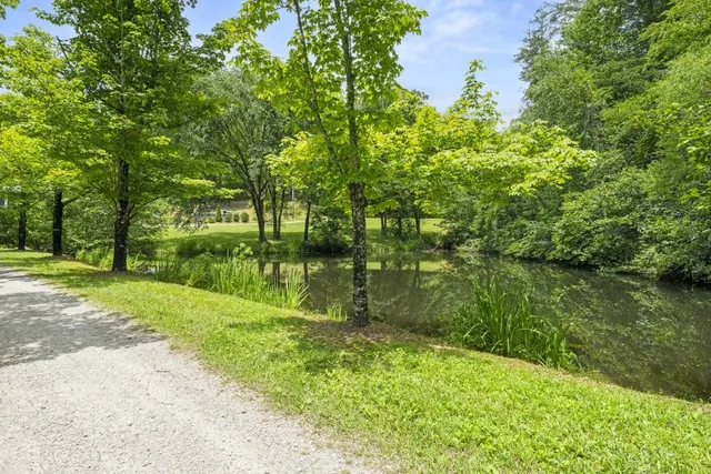 a dinning area with furniture and view of kitchen