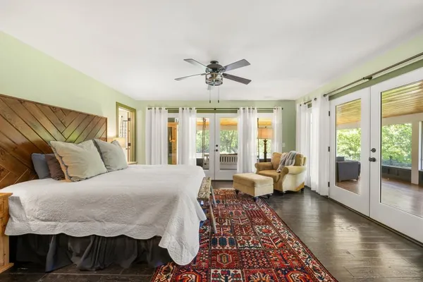 a view of walk in closet and window