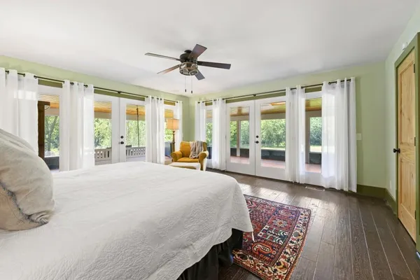 a view of a patio with swimming pool table and chairs