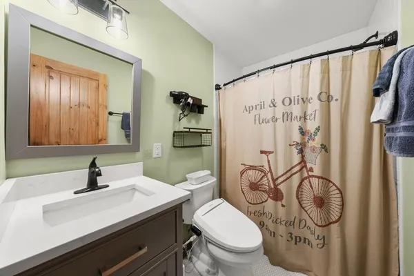 a view of a chair and wooden floor