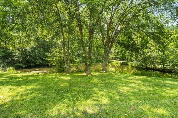 a view of a city with mountains in the background