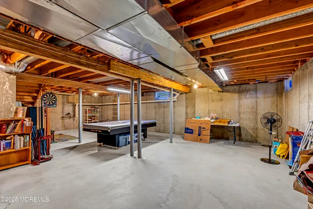 a view of chairs and tables in a room