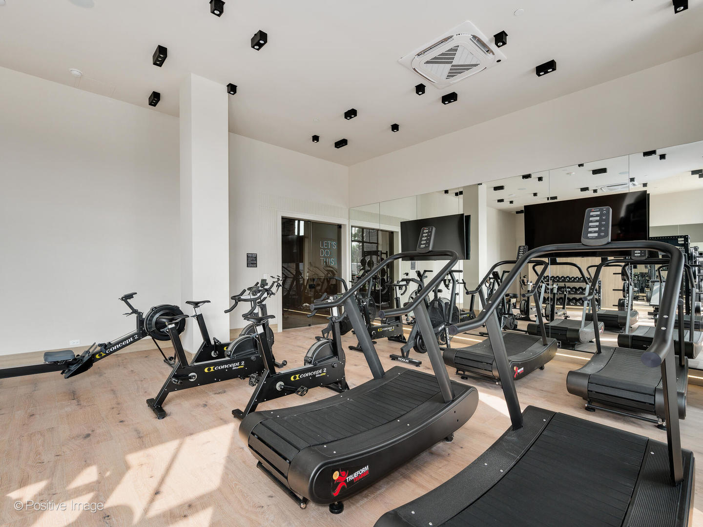 11 West Prospect Avenue, Unit 503 Mount Prospect, IL 60056 - Photo 24 of 72 a living room with lots of gym equipment