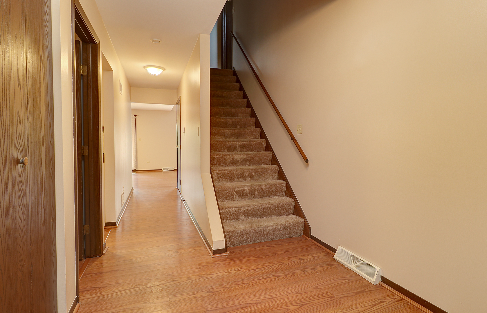 14801 South Penn Road Plainfield, IL 60544 - Photo 11 of 18 a view of entryway and hall with wooden floor