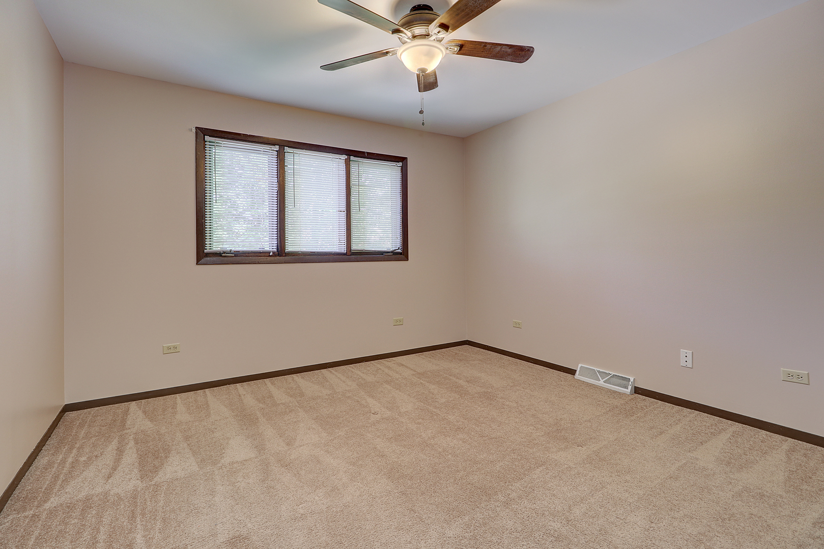 14801 South Penn Road Plainfield, IL 60544 - Photo 13 of 18 a view of an empty room with a window