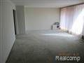 4049 West Maple Road, Unit 104 Bloomfield Hills, MI 48301 - Photo 6 of 10 living.jpg