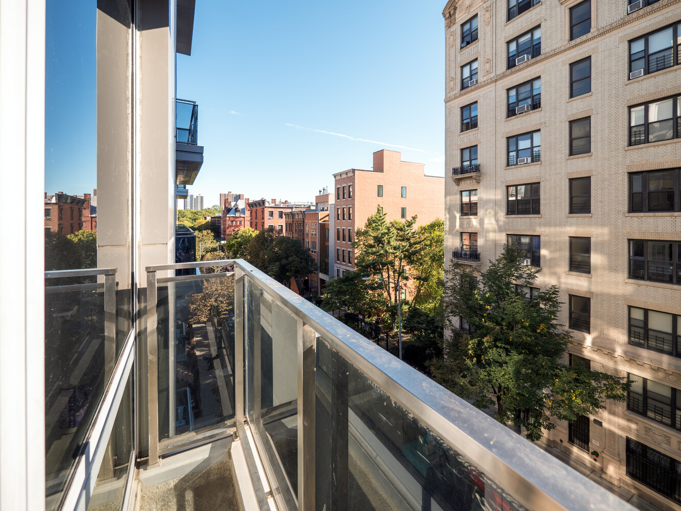 117 West 123rd Street, Unit 5D Manhattan, NY 10027 - Photo 8 of 11 a view of balcony with a potted plant