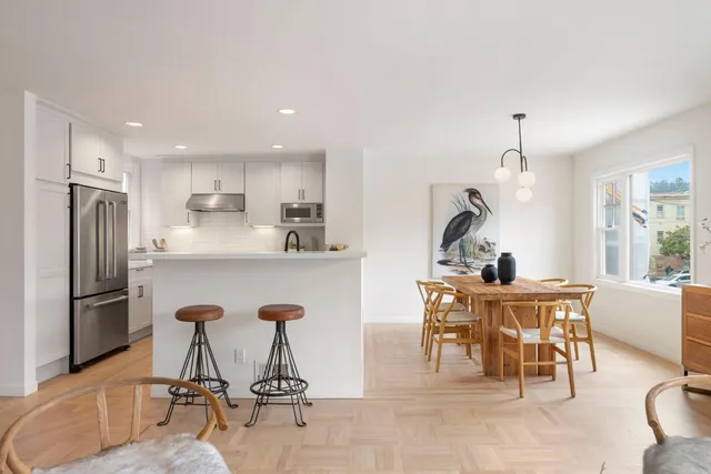 a view of a dining room with furniture
