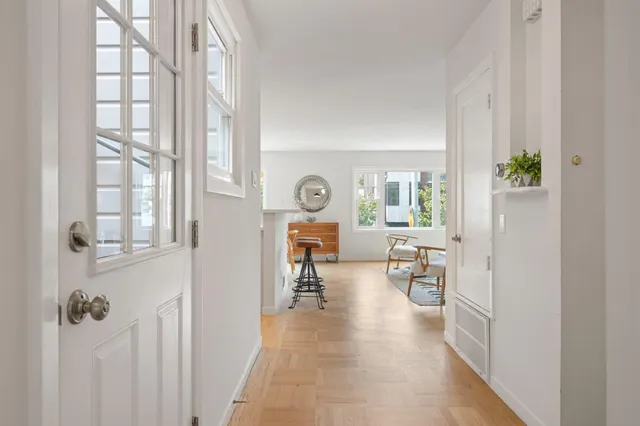 a view of a living room and window