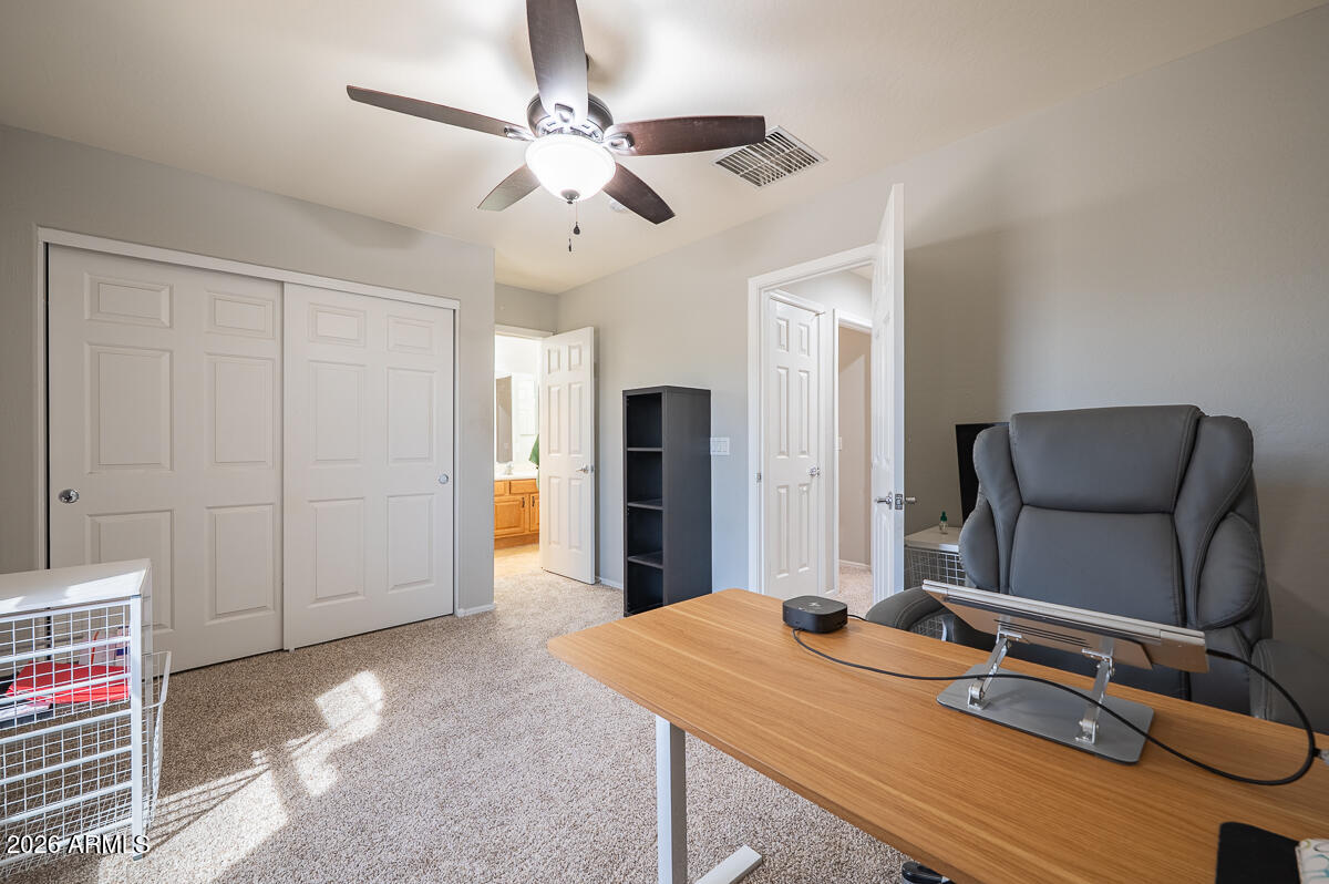 3328 East Merlot Street Gilbert, AZ 85298 - Photo 39 of 48 a view of a livingroom with furniture and a chandelier