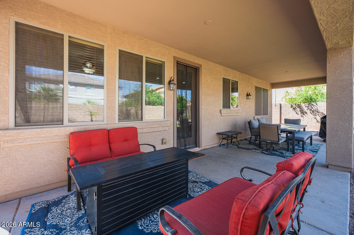 3328 East Merlot Street Gilbert, AZ 85298 - Photo 45 of 48 a living room with furniture and a window
