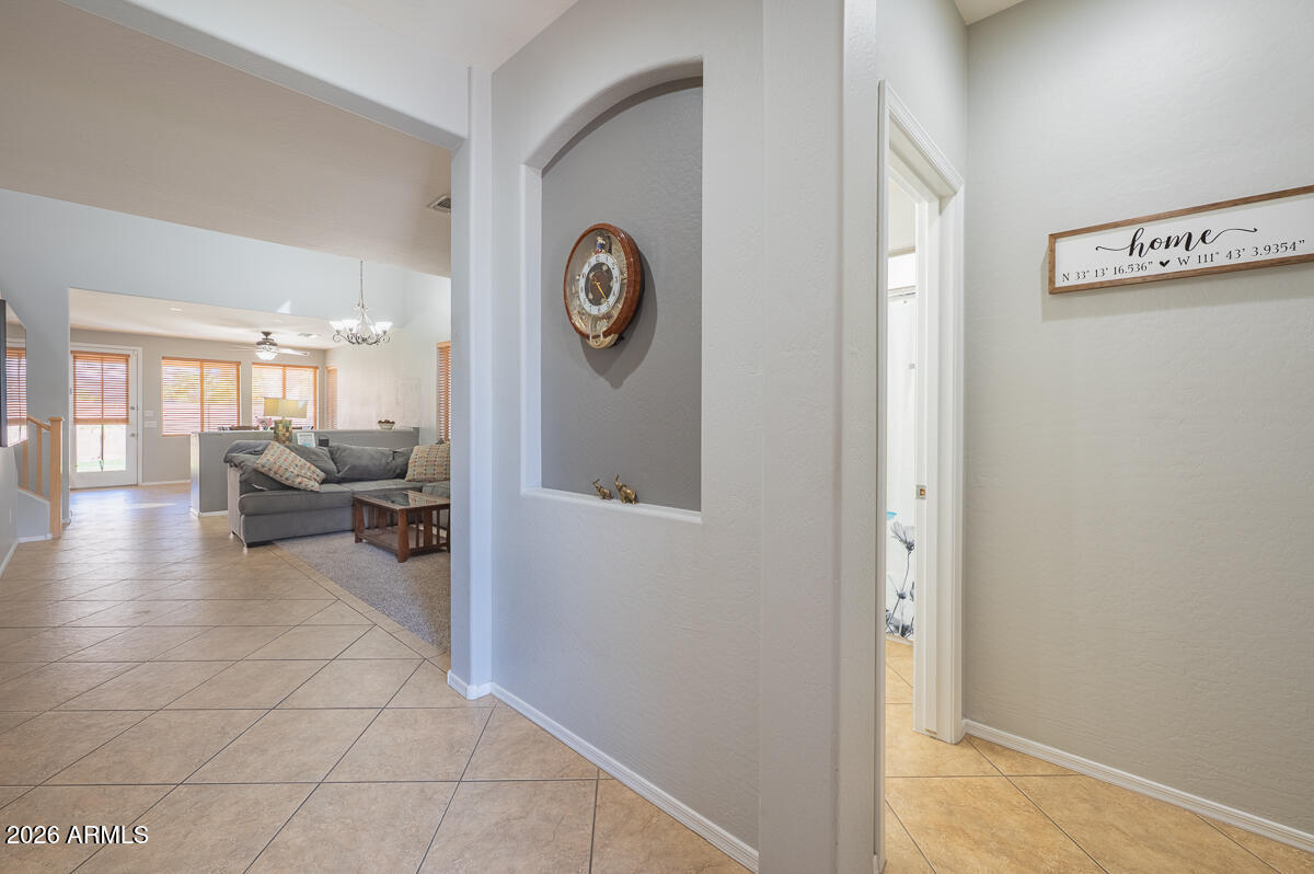 3328 East Merlot Street Gilbert, AZ 85298 - Photo 5 of 48 a view of a living room and hardwood floor