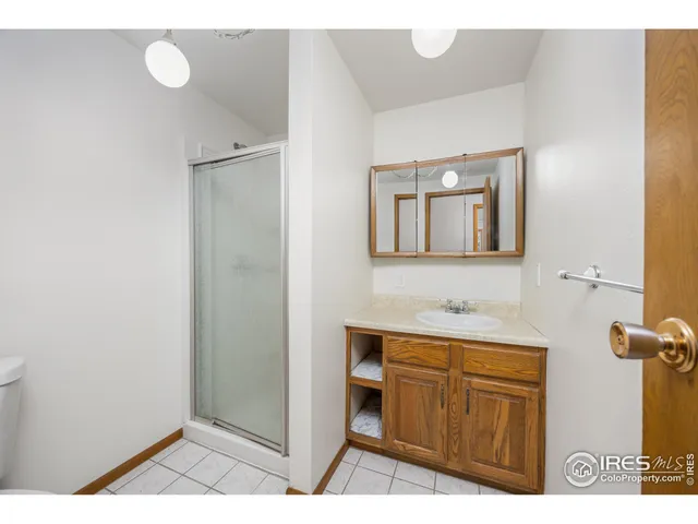 a view of balcony with wooden floor