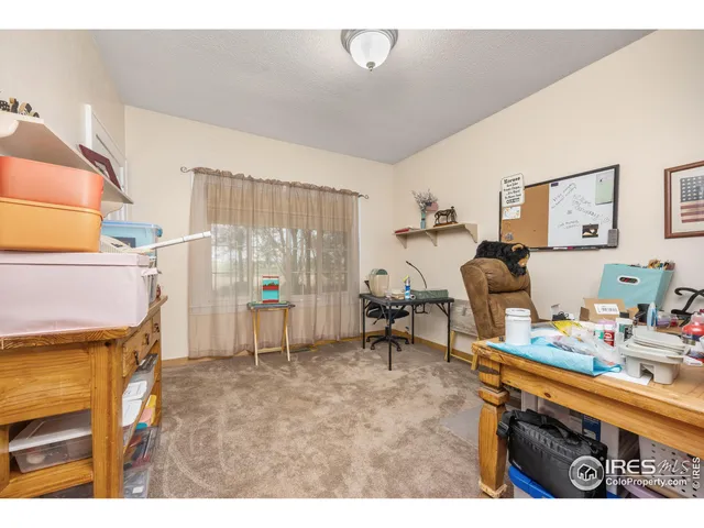 a bathroom with a sink mirror and vanity