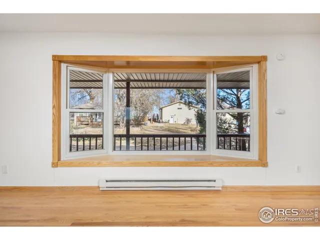 a black and white photo of a living room