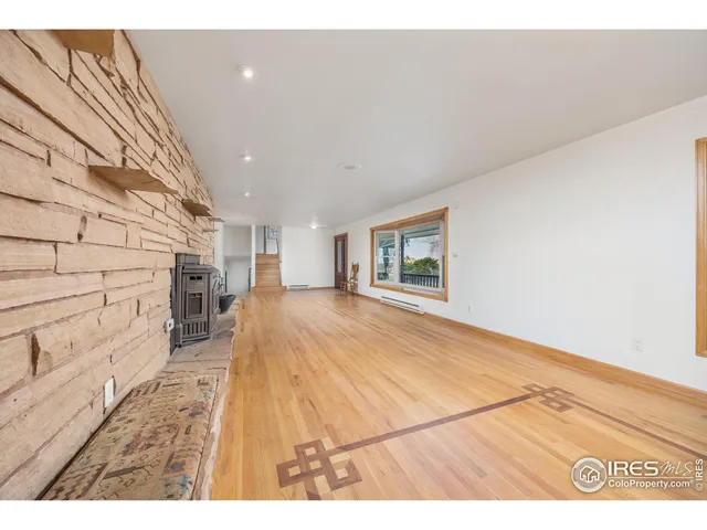 a kitchen with a cabinets and white appliances