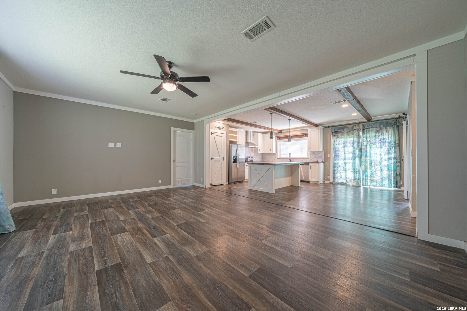 3433 Gander Slough Road Kingsbury, TX 78638 - Photo 7 of 23 wooden floor in an empty room with a window
