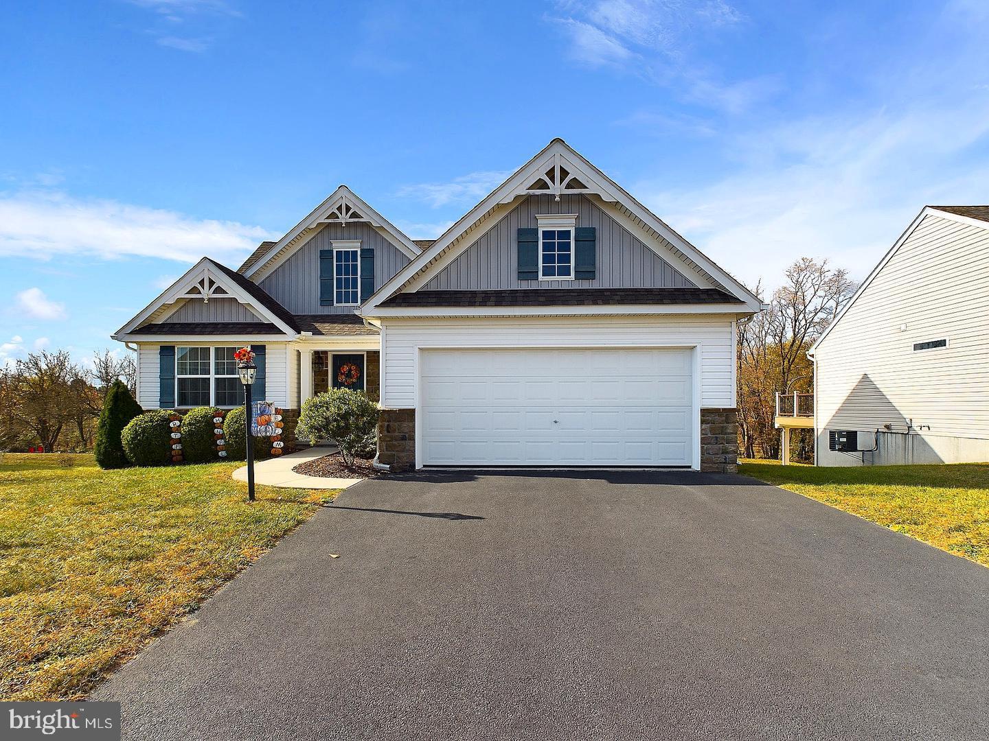 114 Creekview Drive Paradise, PA 17562 - Photo 1 of 67 a front view of a house with a yard