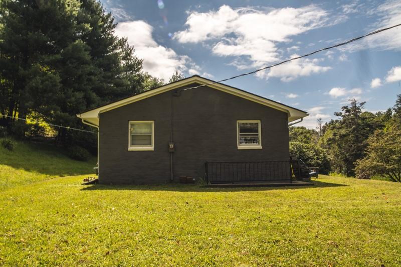 401 Sawmill Road Southwest Willis, VA 24380 - Photo 2 of 31 a house view with swimming pool