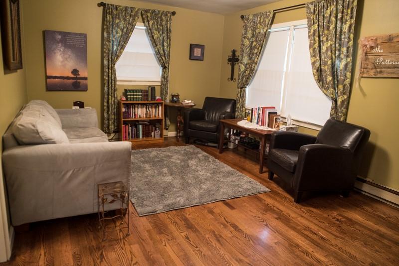401 Sawmill Road Southwest Willis, VA 24380 - Photo 28 of 31 a living room with furniture and a window