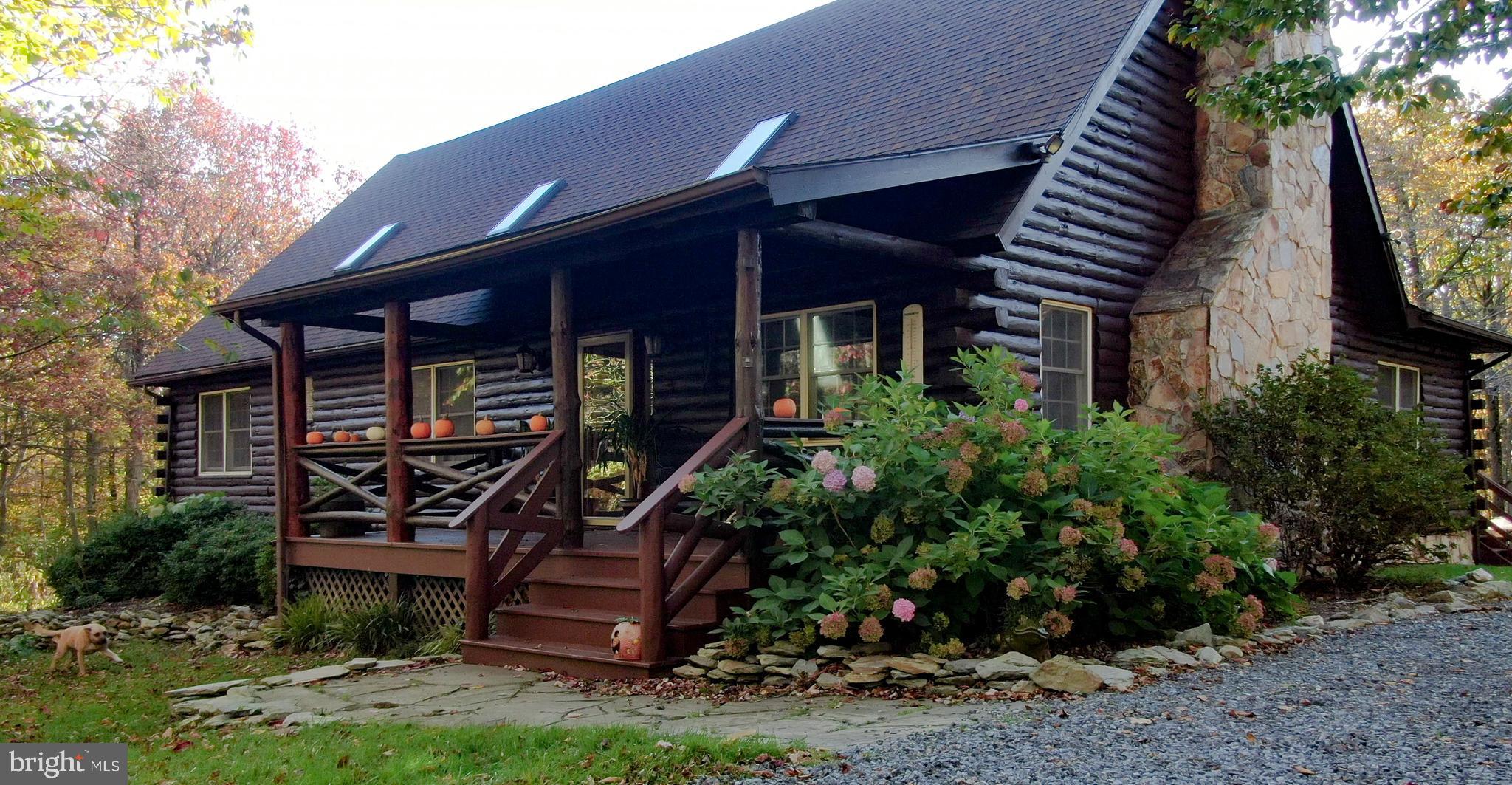 11220 Gambrill Park Road Frederick, MD 21702 - Photo 1 of 62 Gorgeous custom 4-bedroom log home.