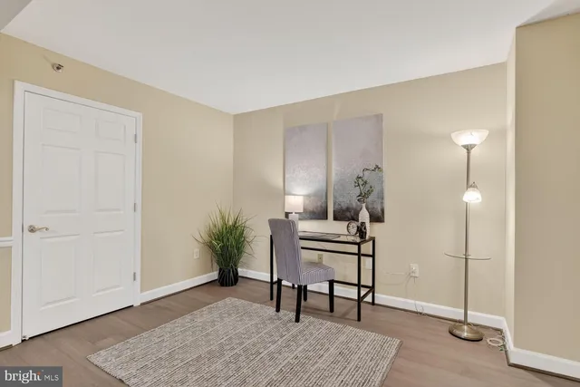 a kitchen with stainless steel appliances a sink stove and cabinets