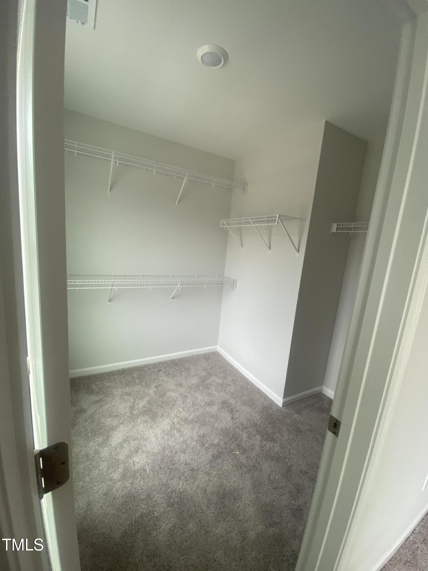 9212 Leaning Post Road, Unit 448 Wake Forest, NC 27587 - Photo 16 of 25 Primary Closet