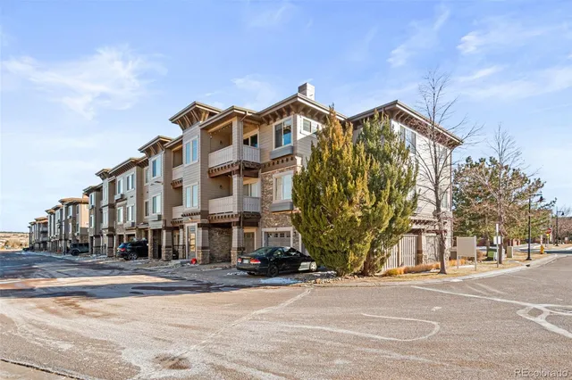 a view of a building with a street