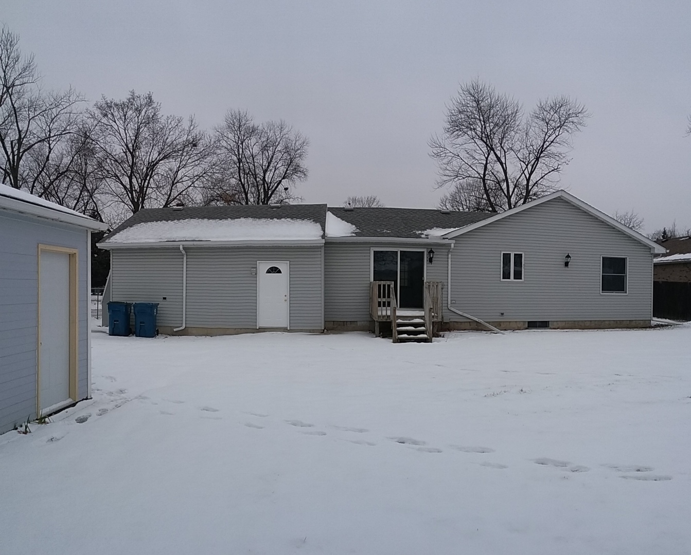 2208 Root Street Crest Hill, IL 60403 - Photo 20 of 21 a view of house with a yard and garage