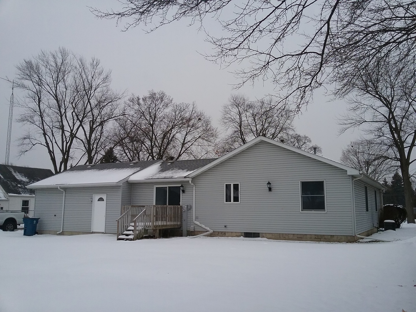 2208 Root Street Crest Hill, IL 60403 - Photo 21 of 21 a white house that has a tree in front of it