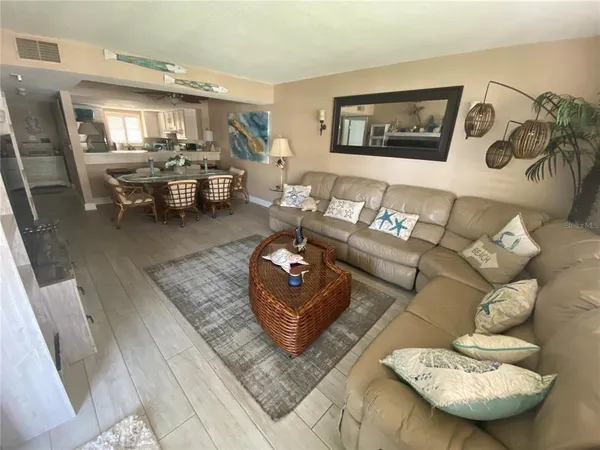 a living room with furniture and a table