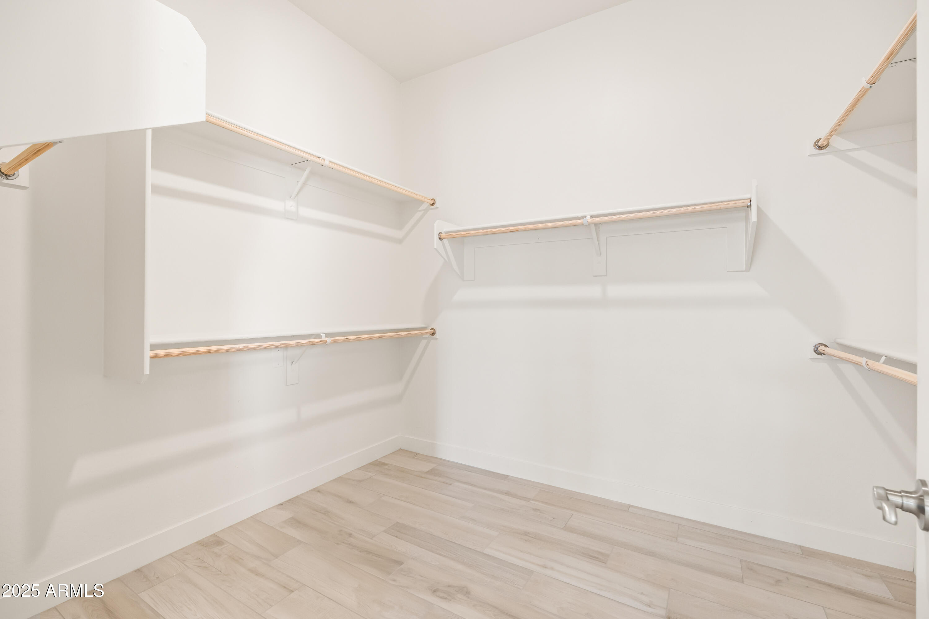 3 North Brenner Pass Road, Unit E3 Queen Creek, AZ 85144 - Photo 56 of 88 4q primary closet 2